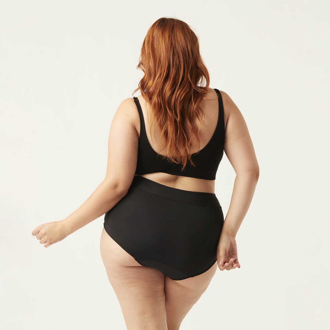 Curvy Woman back view Modibodi high waist bikini swim bottoms